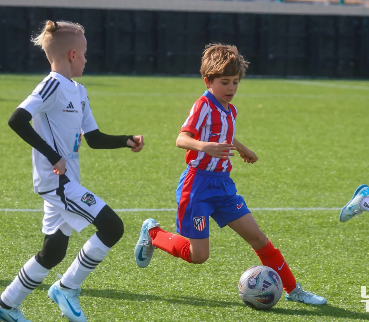 Atletico youth in action